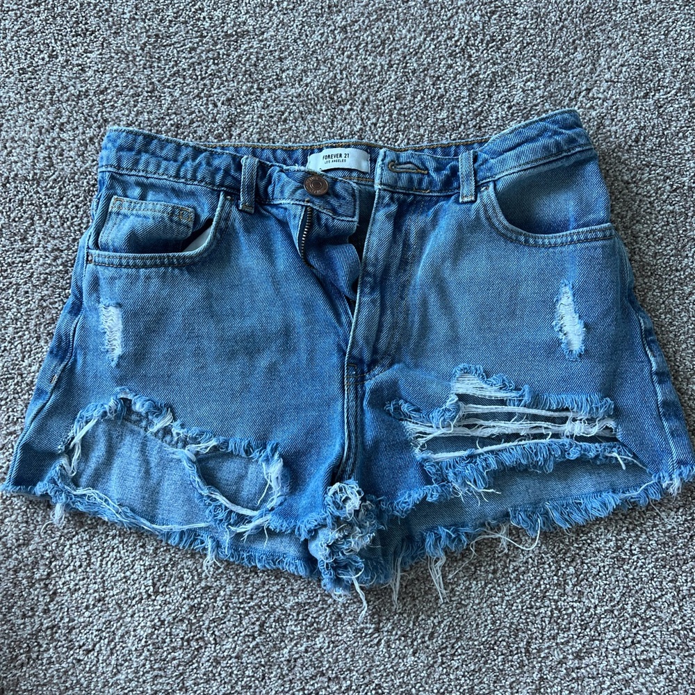 Destroyed denim shorts